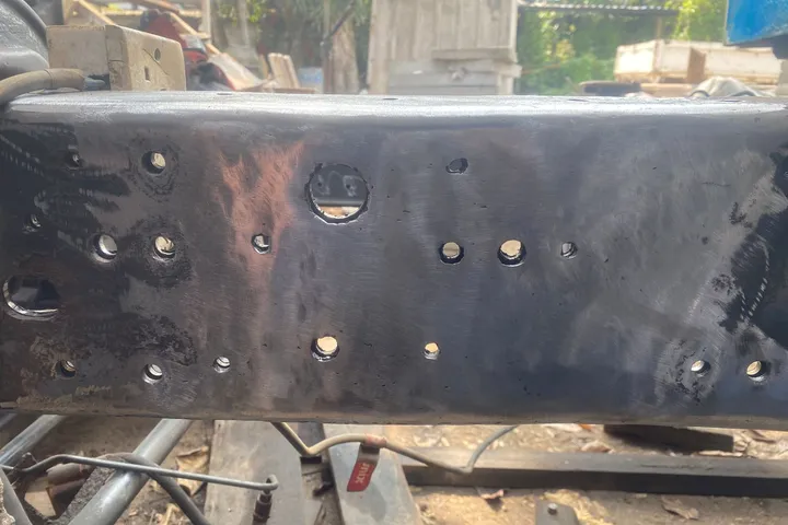 Repaired and primed chassis rail