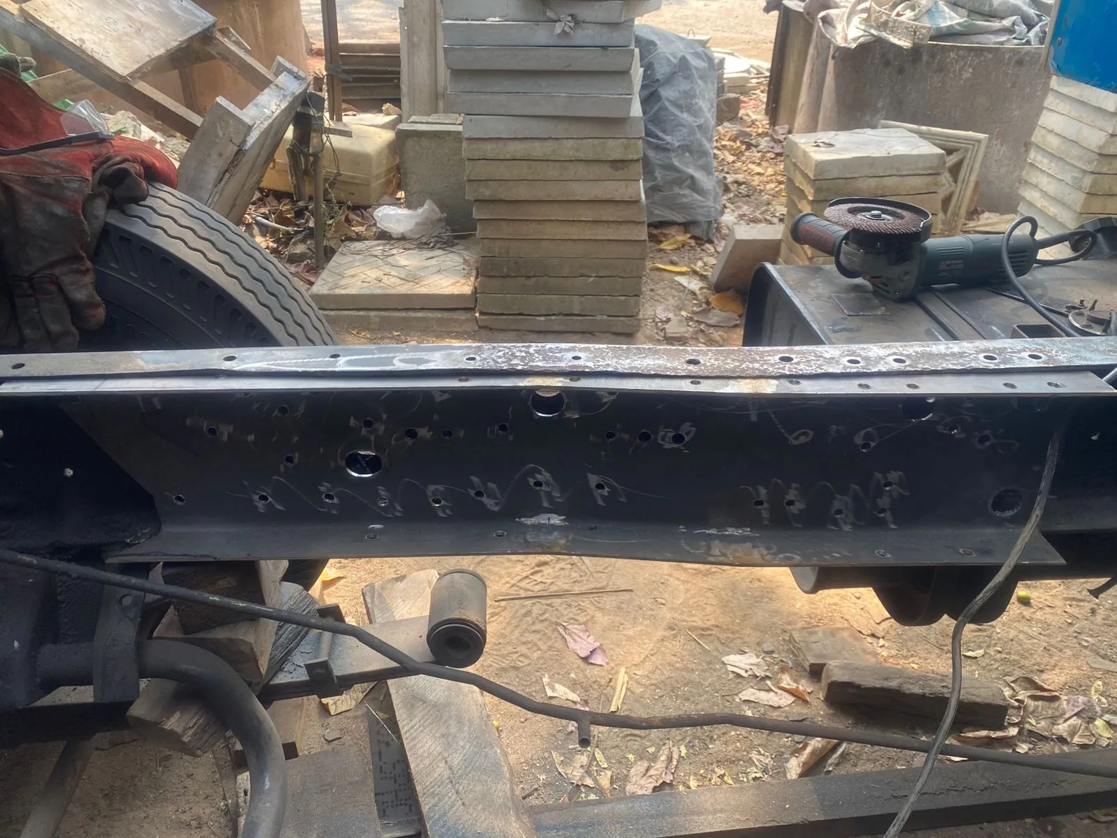Angle grinder shaping chassis rail